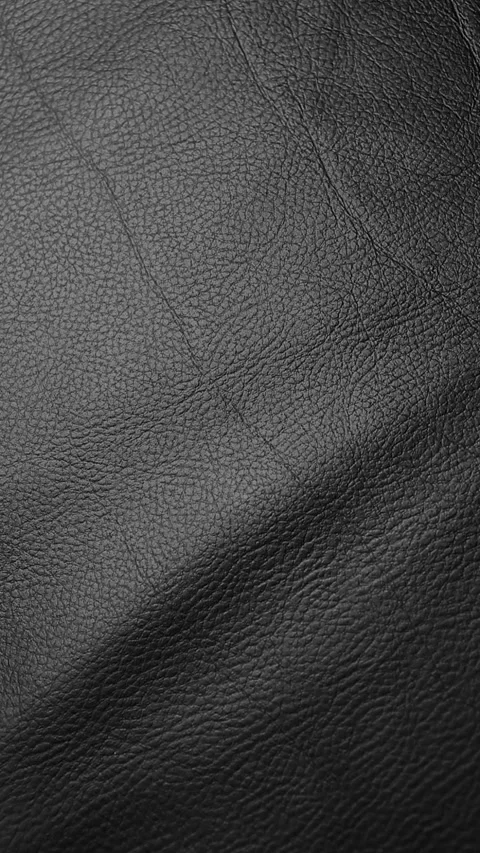 Vertical footage of dark leather background Stock Footage 300561903