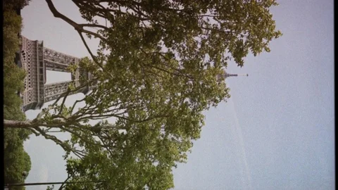 Vertical footage Eiffel Tower in Paris, France 16mm vintage film tape Stock Footage 107878145