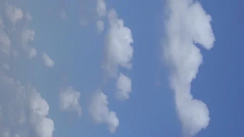 Vertical Footage Plump White Clouds in a Blue Sky in the Afternoon in Cloudy Goo Stock Footage 218110117