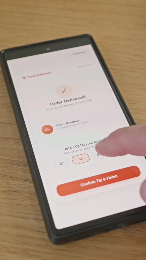 Vertical footage showing close-up of user tapping to add digital tip for Stock Footage 341860647