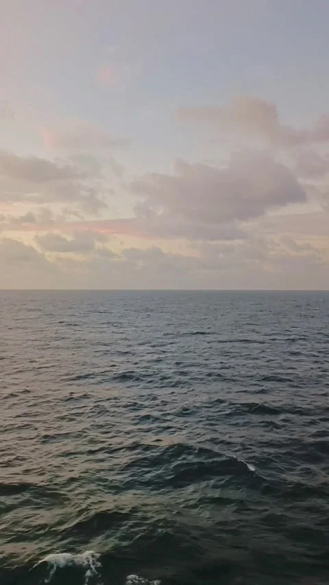 Vertical footage sunset in ocean Stock Footage 254131399