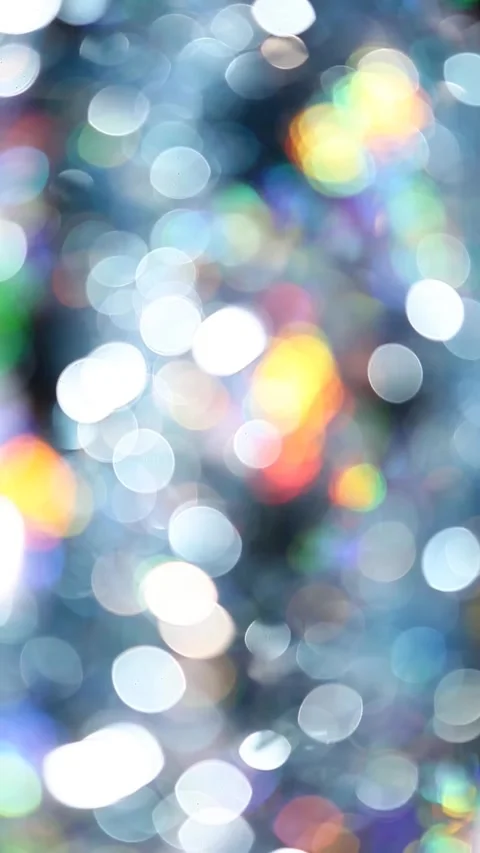 Vertical footage of tinsel bokeh background Stock Footage 256141950