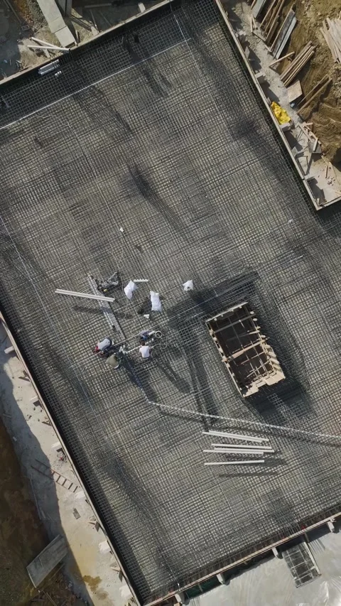 Vertical Footage Top-Down Construction Scene with Steel Reinforcement Pattern Stock-Footage 341755300