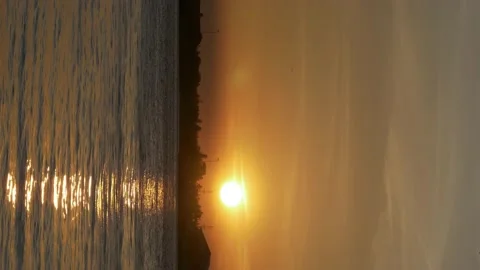 Vertical footage video, dramatic sunset of Borneo over the Barito river Stock Footage 141299445