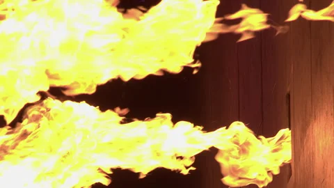 Vertical format: Flames burst from pyrotechnic stage pots at concert Stock Footage 339845828