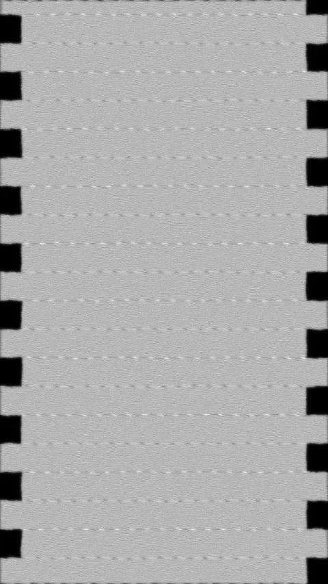 Vertical format flickering and moving down old movie film. Black and white Video stock 295151308