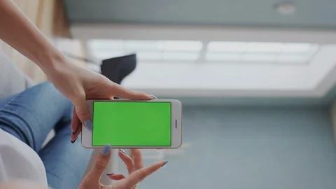 Vertical format footage. Chroma Screen, GreenScreen or Mockup Tracking. Click in Stock Footage 122418122