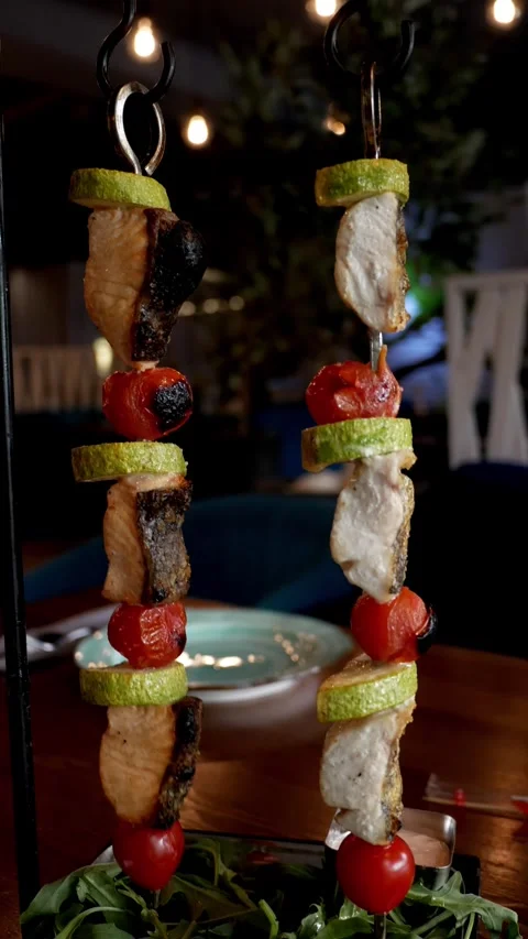 Vertical format. Grilled salmon fillet and butterfish kebab with vegetables. Bea Stock Footage 275235279