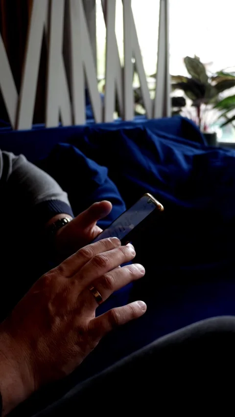 Vertical format. Male hands using mobile phone for texting, scrolling and typing Stock Footage 275037146