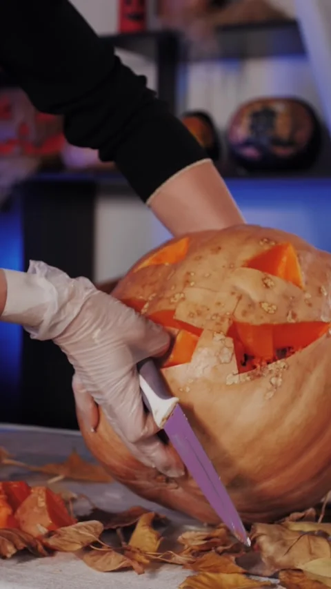 Vertical Format. Pumpkin Carving Close-Up, Stock-Footage 320894832