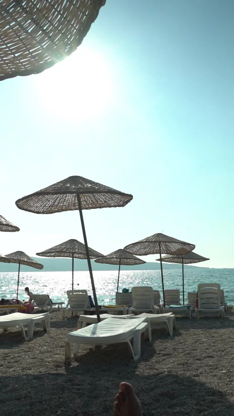 Vertical format, Sea, Beach, Umbrellas Stock Footage 317001954