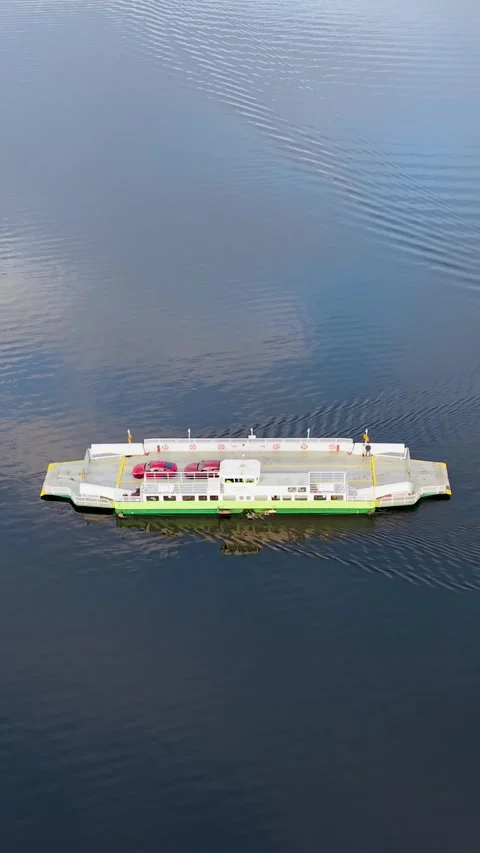 Vertical Format Side-On Drone Shot of Ferry Crossing Lake Windermere with Red Stock Footage 326636585