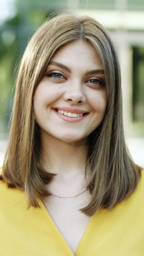 Vertical Format Video of Beautiful Brunette Sexy Smiling Woman with Long Hair Stock Footage 305331749