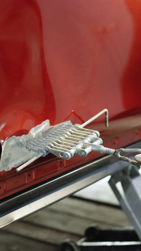 Vertical Format Video of Body work restoration of paintwork. Car repair shop Stock Footage 303843193