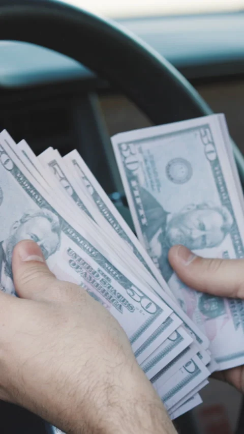 Vertical Format Video of Businessman Counting Money Usd Bills Payday Inside Car Stock Footage 302650412