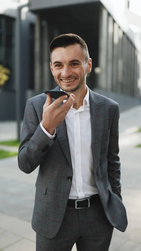 Vertical Format Video of Businessman use smartphone to send voice messages Stock Footage 302799555