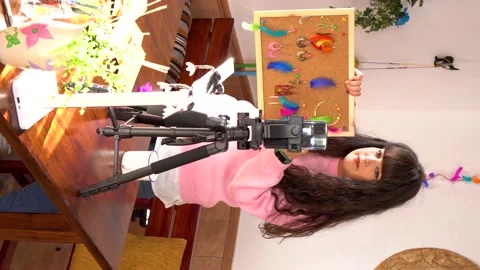 Vertical format video: Creative female designer showing board with colorful h Stock Footage 171020543