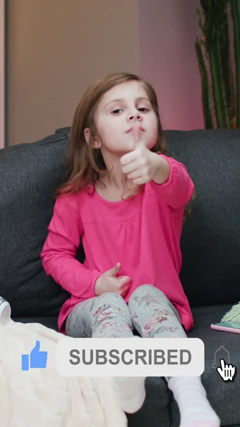 Vertical Format Video of Female kid vlogger asking online audience to like and Stock Footage 303380513
