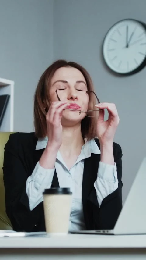 Vertical Format Video of Frustrated young woman keeping eyes closed while Stock Footage 303008207