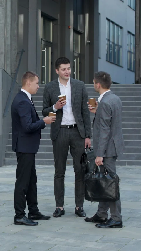 Vertical Format Video of Group of business people drink coffee against the Stock Footage 302561766