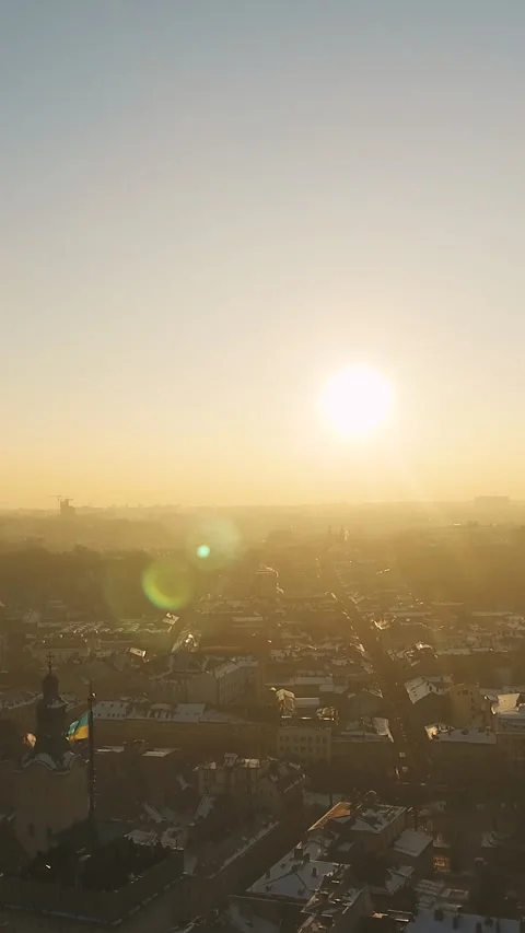 Vertical Format Video of historical center of Lviv in winter. Authentic Lviv Stock Footage 309638684