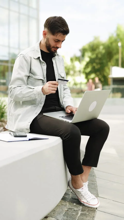 Vertical Format Video of male buyer paying on website via e commerce service Stock Footage 305862953