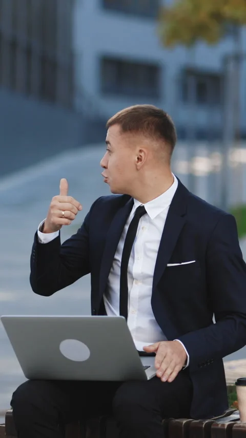 Vertical Format Video of Man business coach giving online interview speaking on Stock Footage 302805420