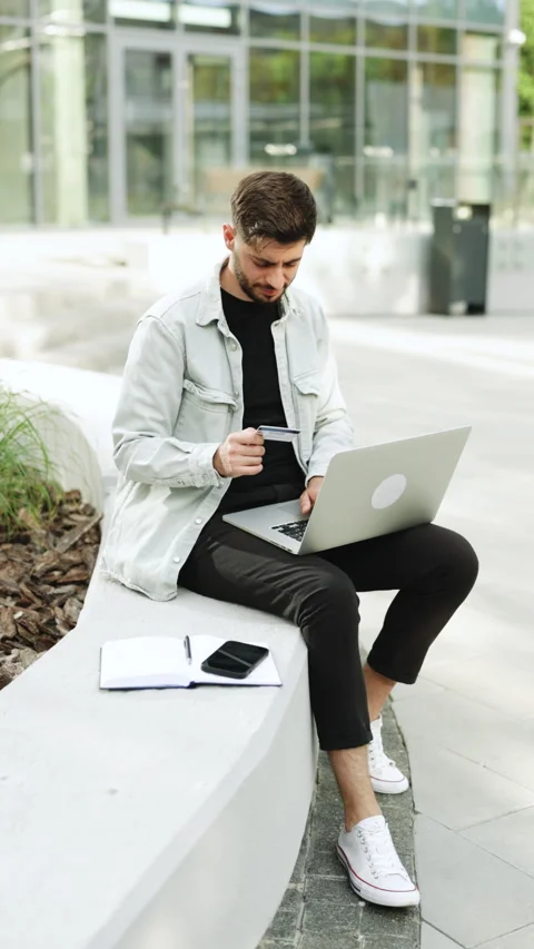 Vertical Format Video of man customer using computer e-banking service making Stock Footage 305860790