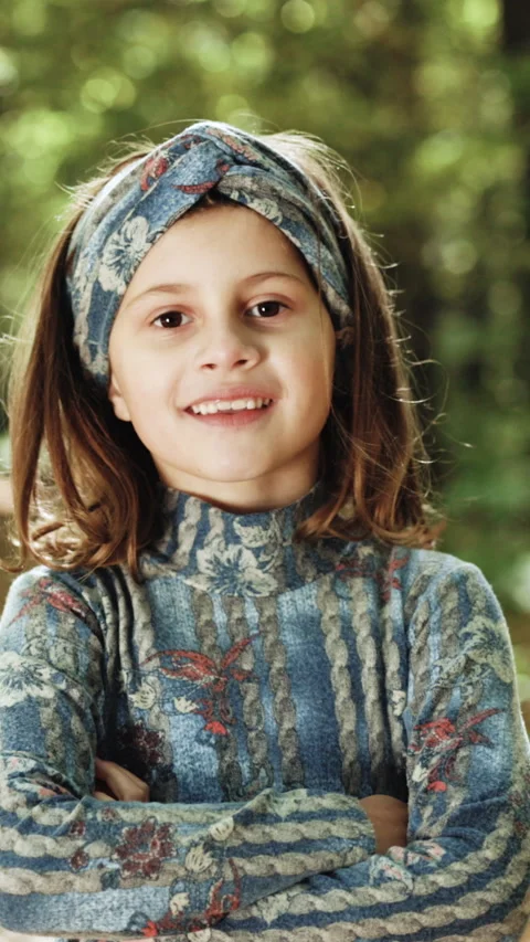 Vertical Format Video of Portrait of confident stylish young little kid girl Stock Footage 304756021