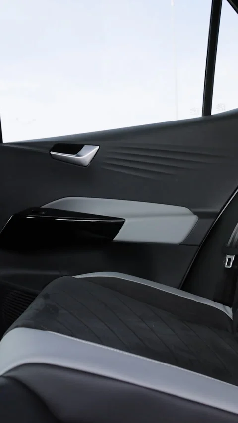 Vertical Format Video of Rear leather passenger seats in modern electric car Stock Footage 306463040