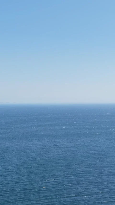 Vertical format video showing a clear, unobstructed view of the Atlantic Ocean Stock Footage 346657430