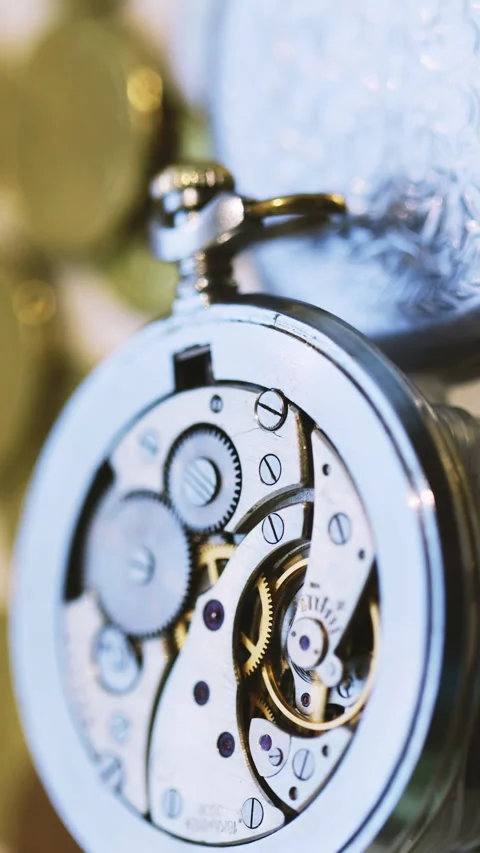 Vertical Format Video of The working mechanism of the old retro pocket watch of Stock Footage 309667148