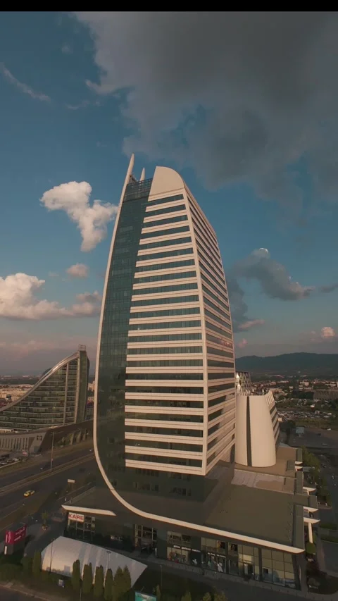 Vertical FPV drone flight approaching modern skyscraper in Sofia, Bulgaria. Stock Footage 340814357