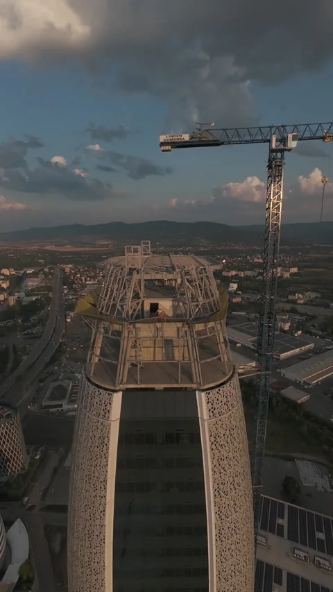 Vertical FPV drone flight ascending along modern skyscraper in Sofia, Bulgaria. Stock Footage 340814665