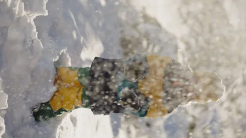 Vertical frame A carefree child dances joyfully in the snow celebrating freedom Stock Footage 293757137