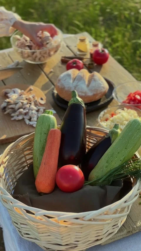 Vertical frame highlights farm-fresh produce arranged in wicker basket Stock Footage 321612249