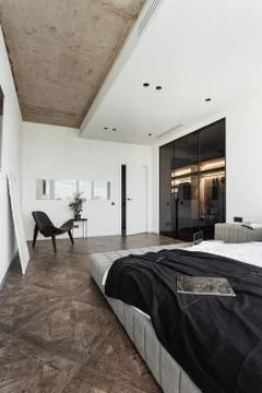 A vertical frame with an interior in a modern style, you can see the front door Stock Photos