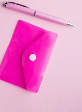 Vertical frame with pink background, Flatley, PLASTIC paper ENVELOPE and pink Stock Photos
