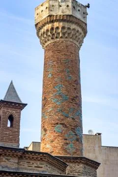 Vertical frame shoot of old ottoman built mosque minaret with masonry colorfu Stock Photos