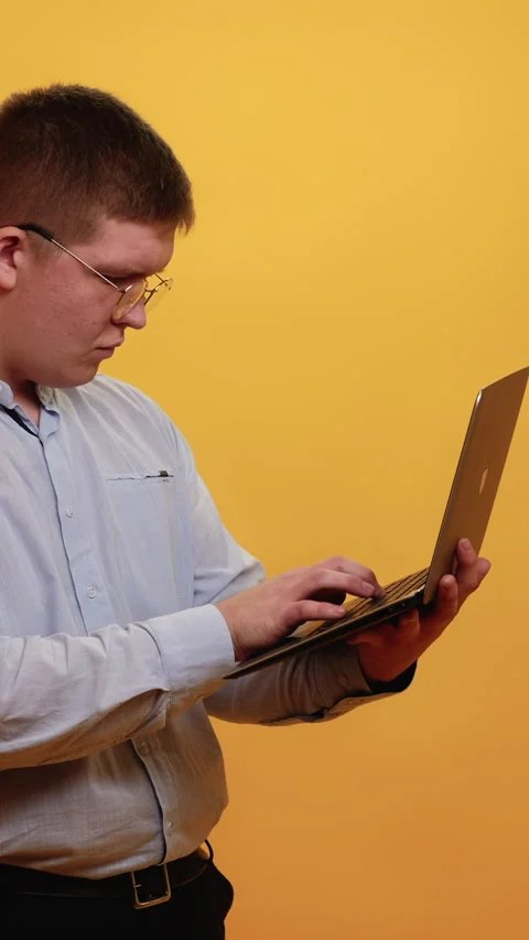 Vertical freelance work overweight man laptop Stock Footage 286400272