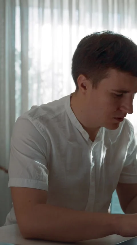 Vertical of Freelancer in hurry working on different computers at home Video stock 275640229