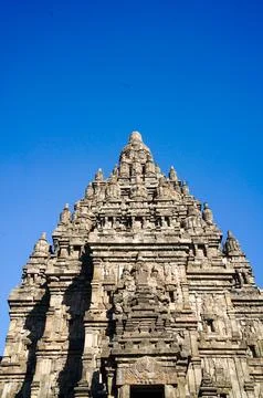 Vertical frontal view highlights the richly carved entrance and towering cr.. Stock Photos