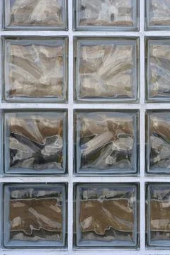 Vertical full frame background texture of square glass brick blocks Stock Photos