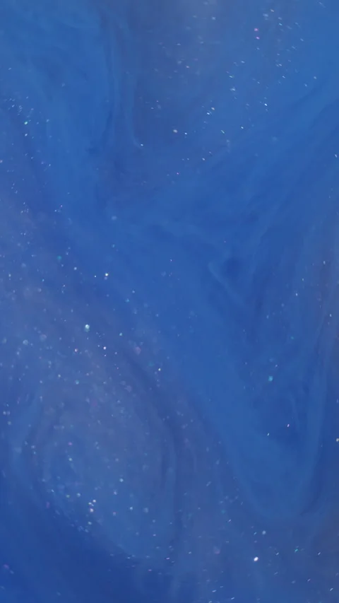 Vertical glitter art blue paint cloud splash swirl Video stock 333290333