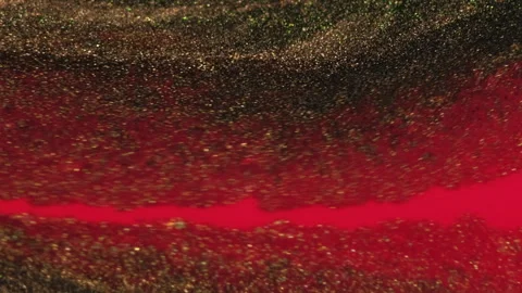 Vertical Glitter fluid drip paint mix red bronze ink spill Stock Footage 263716804