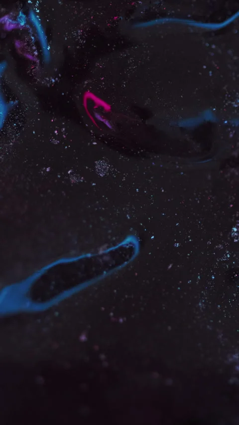 Vertical Glitter fluid flow paint spill blue pink black ink Stock Footage 283610264
