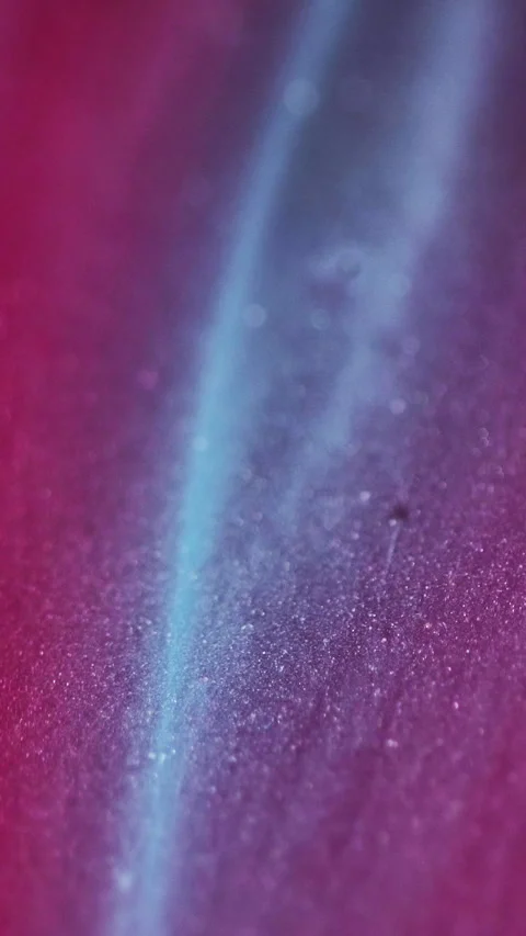 Vertical glitter fluid spill bokeh light red ink Stock Footage 303877883