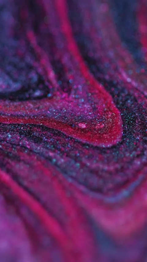 Vertical Glitter fluid spill paint blend pink blue emulsion Video stock 278382033