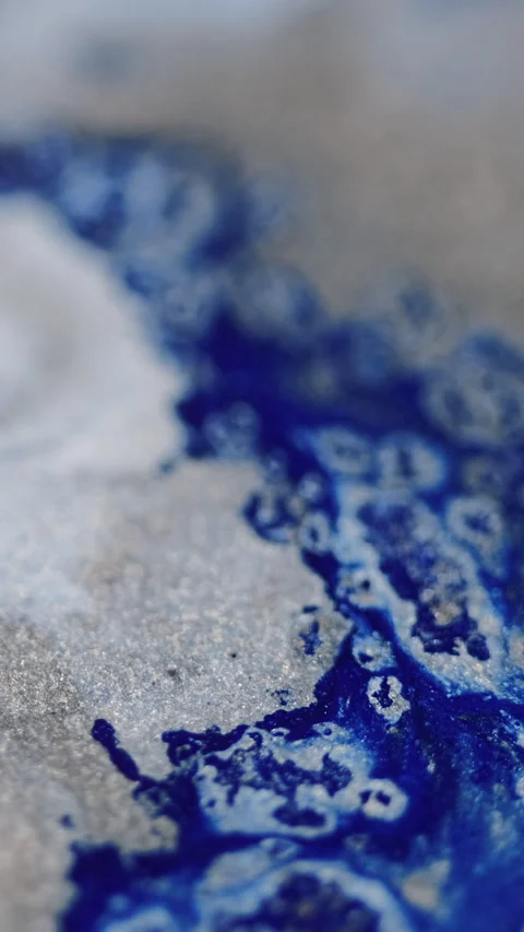 Vertical glitter fluid spill paint mix blue gray Video stock 285695596