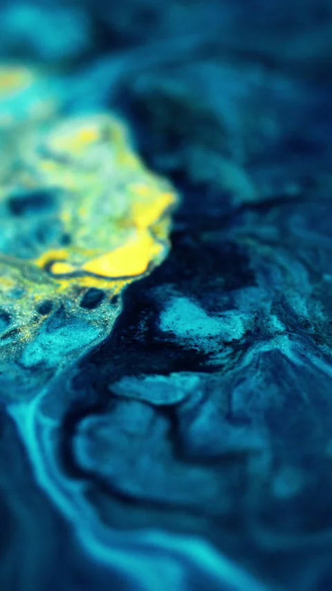 Vertical glitter fluid splash ink wave blue yellow Stock Footage 286400325